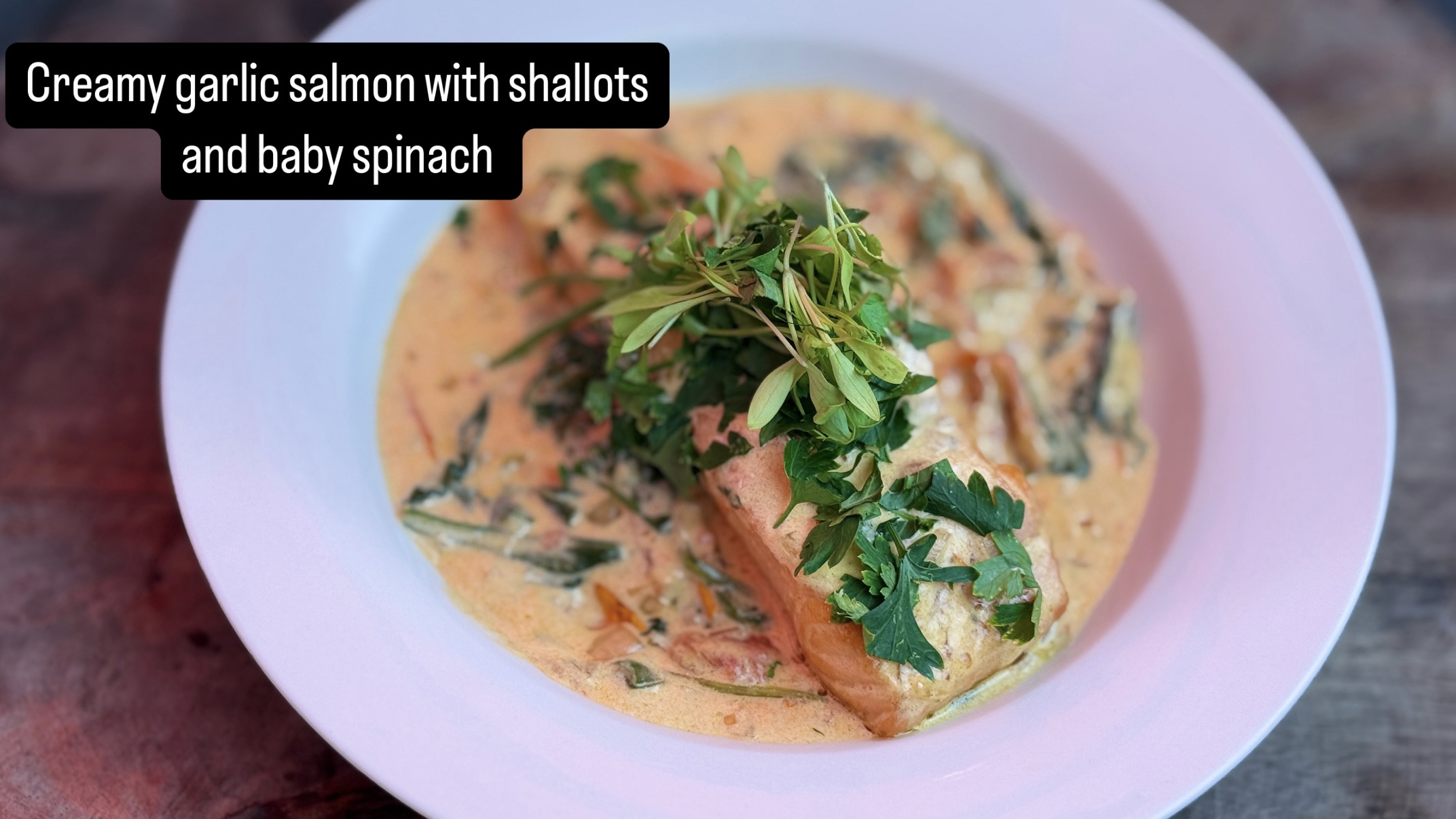 creamy garlic salmon with shallots and baby spinach